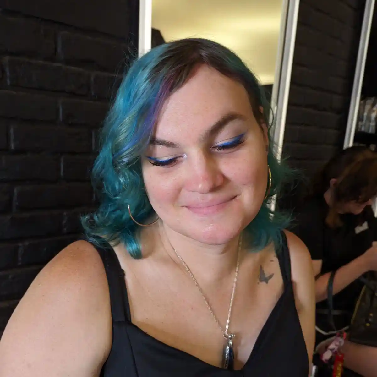 Full frontal sinus setback with hairline lowering. Orbital bones were reduced to open the eyes, and chin and jaw angle contouring gave a more V-shaped, heart-like face.