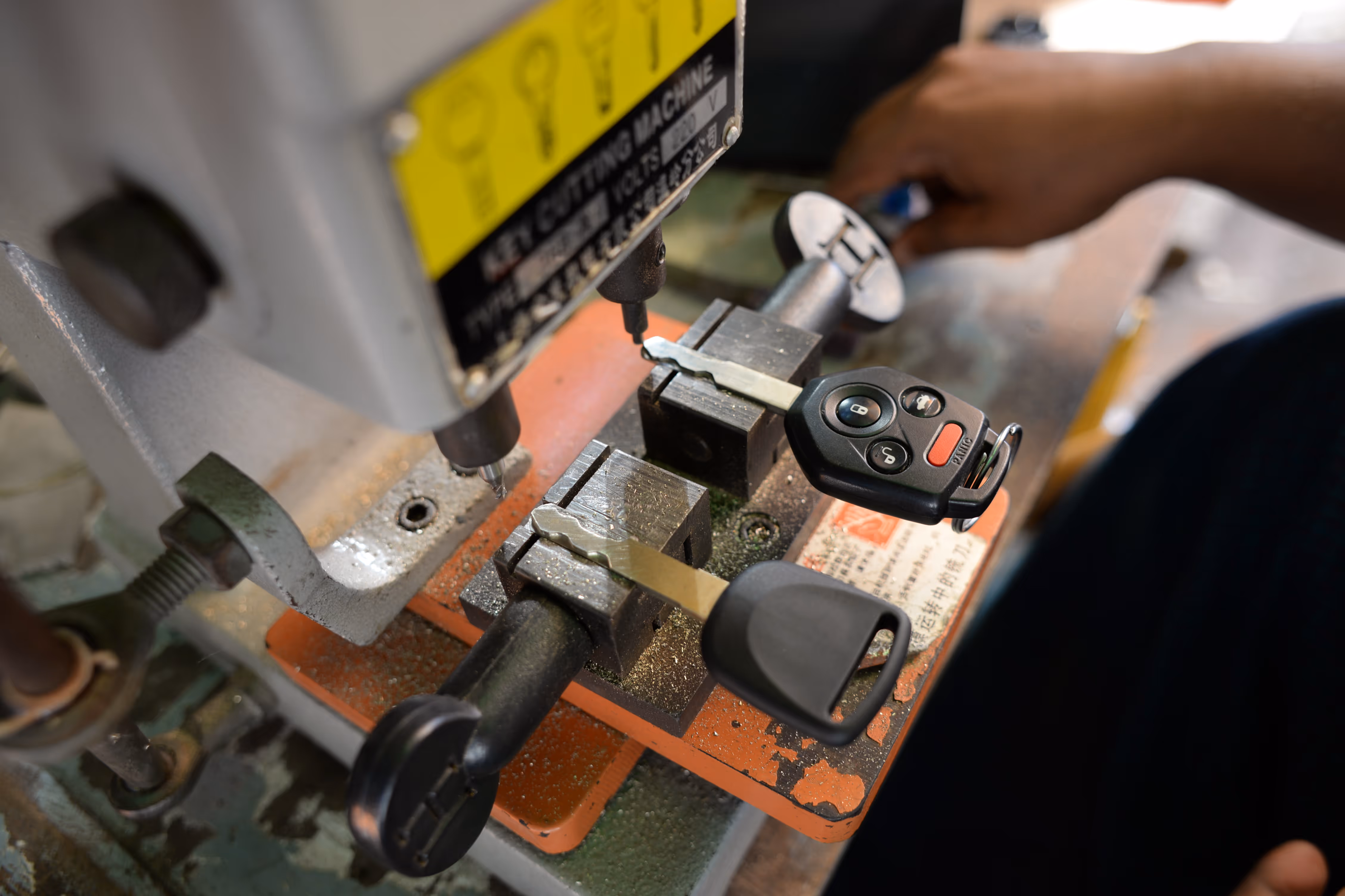 Car key duplication service in Dubai using professional key cutting machine