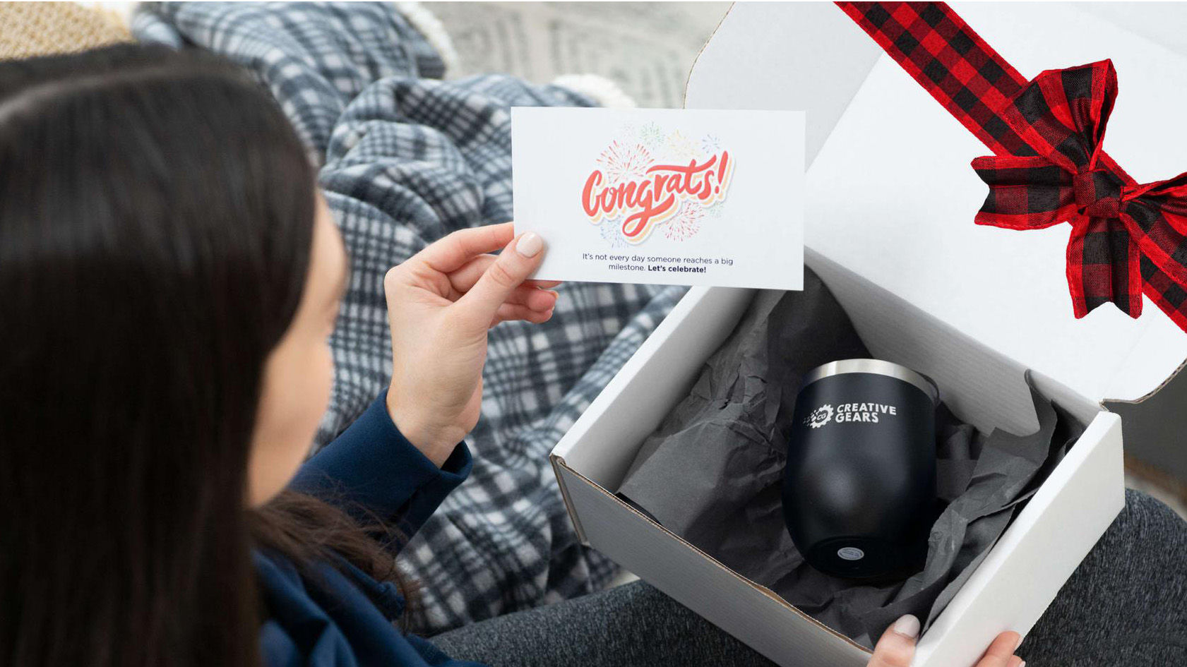 An image of someone opening up a custom swag box.