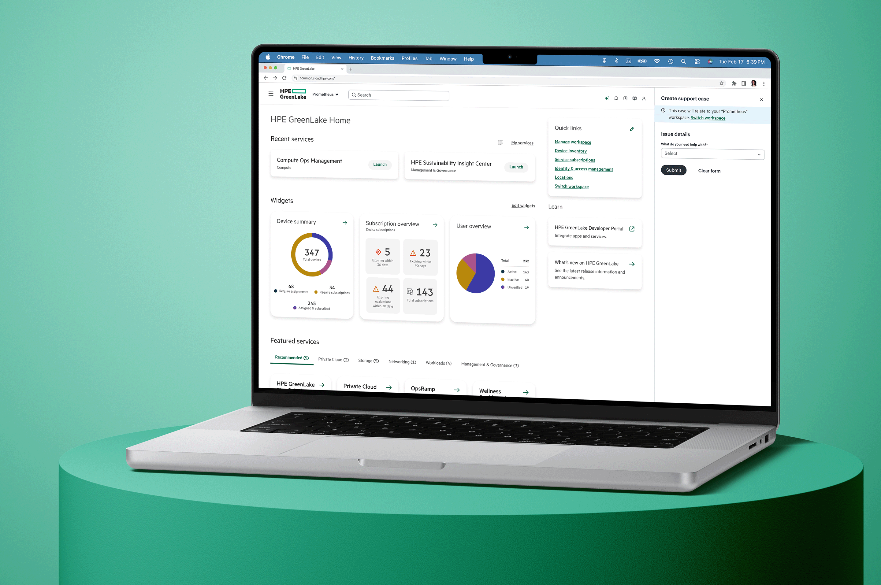 Desktop monitor displaying HPE GreenLake Home interface with recent services, widgets for device summary, subscription overview, user overview, quick links, and support case creation form.