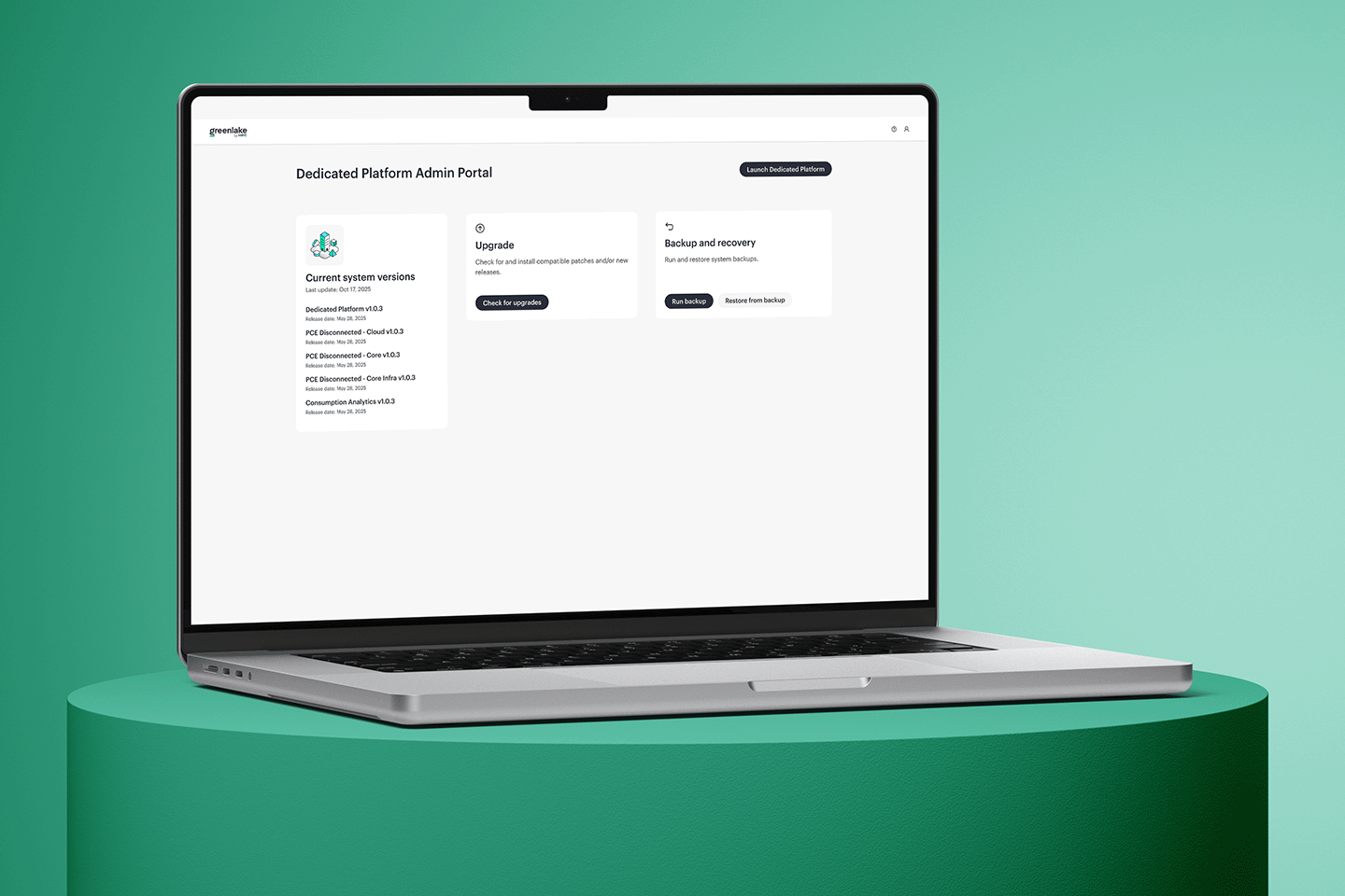 Computer monitor on a desk showing a Dedicated Platform Admin Portal with system version details, upgrade and backup options.