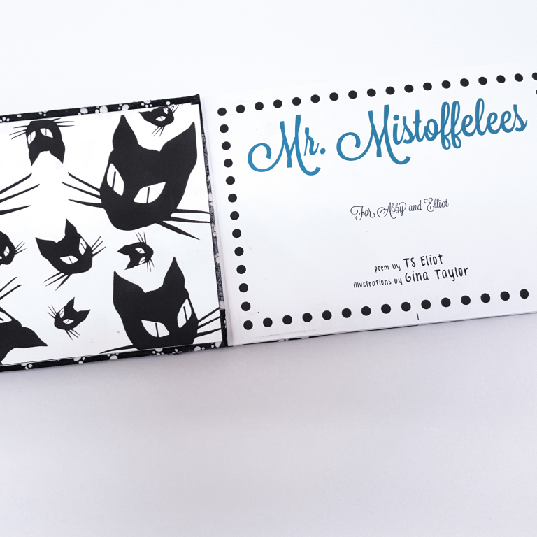 Open book titled 'Mr. Mistoffelees' with black cat illustrations on the left page and title text with credits on the right.