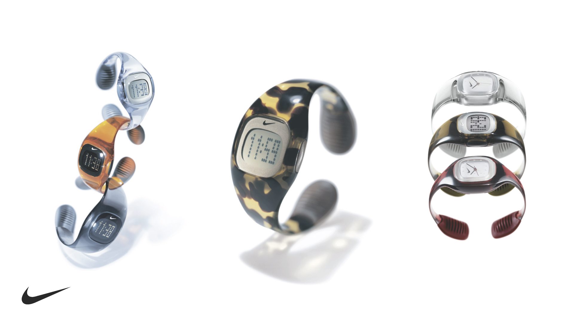 Nine Nike digital and analog wristwatches in various colors and patterns arranged in three groups on a white background with the Nike logo.