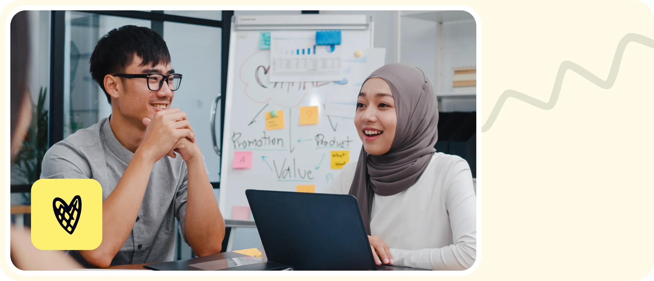 Decorative illustration with a wavy line, a meeting scene image, and a heart shape icon.