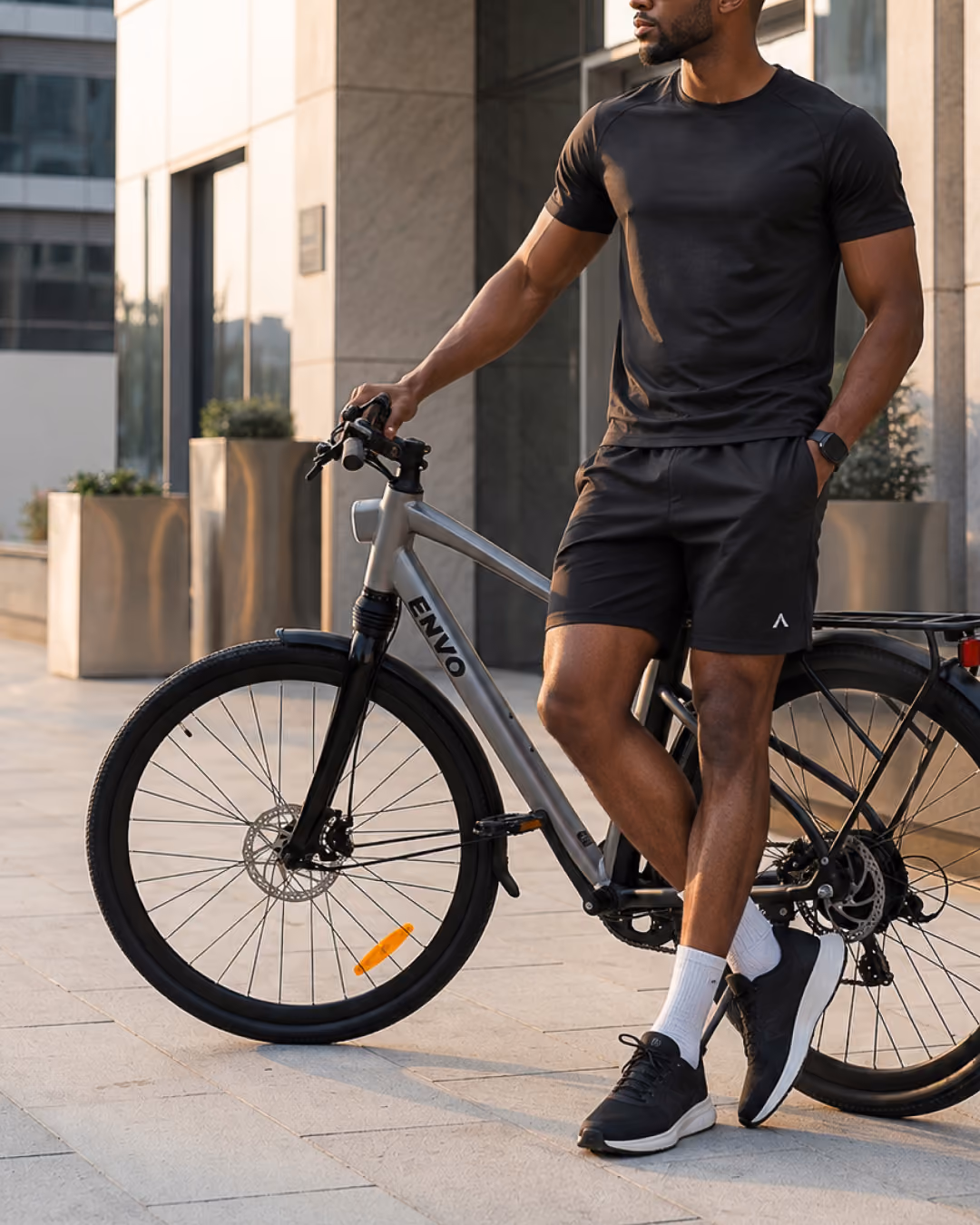 Rider commuting through the city on an ENVO Stax Pro e-bike
