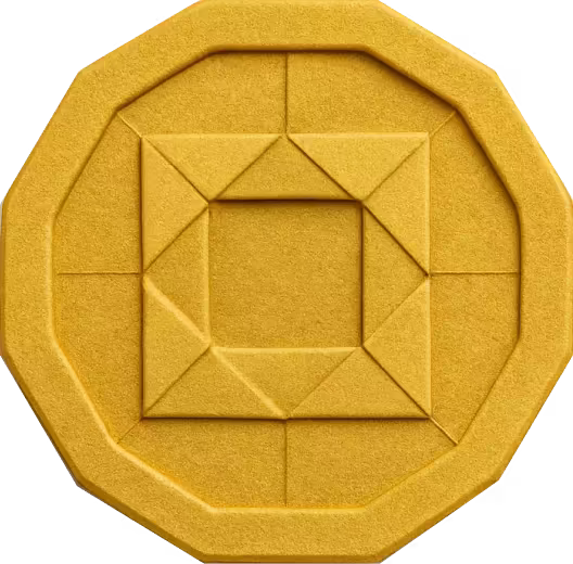 Gold coin with a geometric square pattern engraved in the center and a raised border.