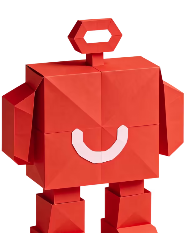 Red origami robot figure with a key-like shape on top and white smile detail on front.
