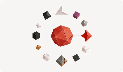 Arrangement of various colorful polyhedral shapes in a circle with a larger red polyhedron in the center connected to a red arrow shape.
