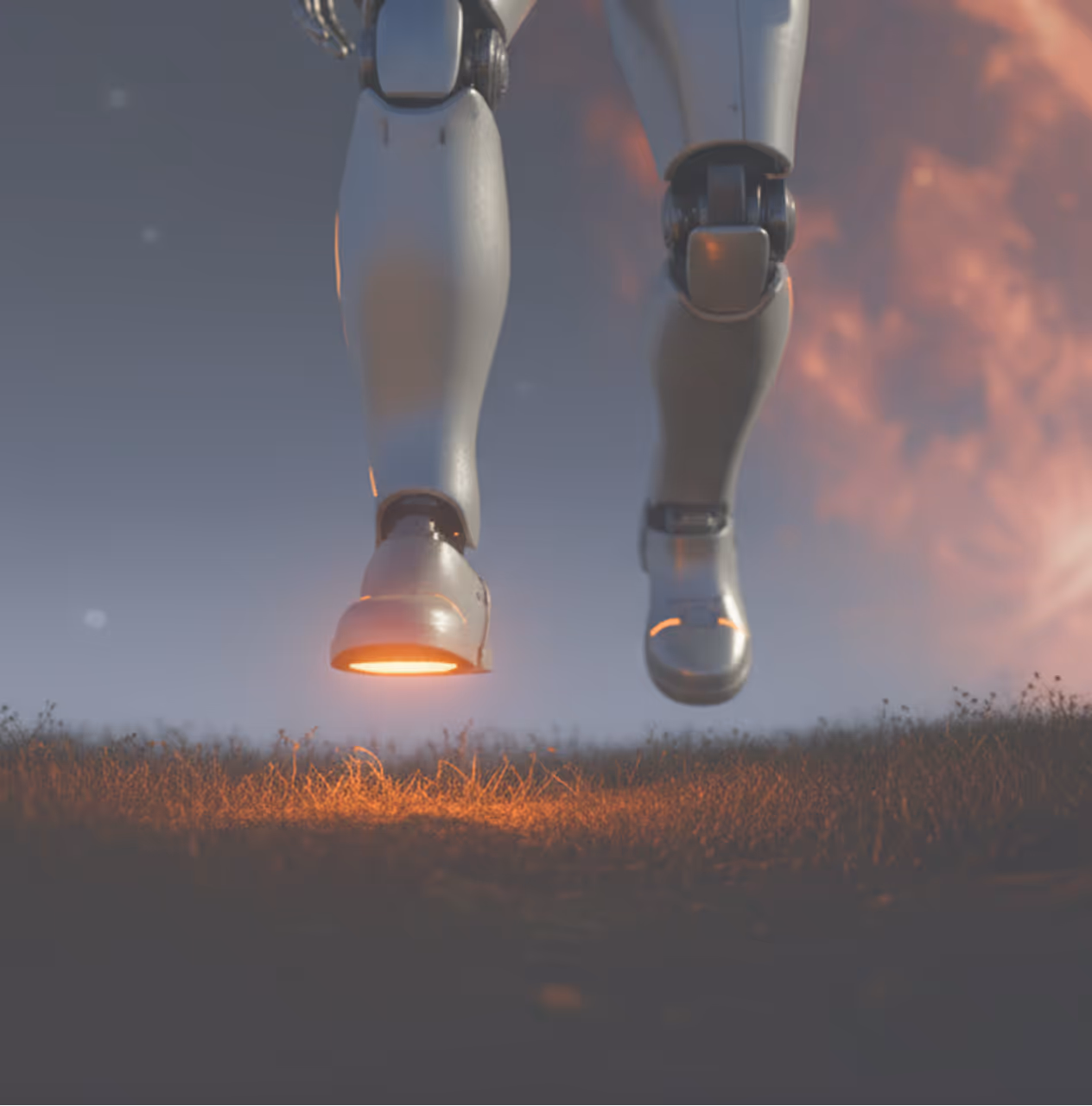 Les jambes d'un robot en métal levant du sol avec une lumière orange sous ses pieds au-dessus d'un champ herbeux au crépuscule.