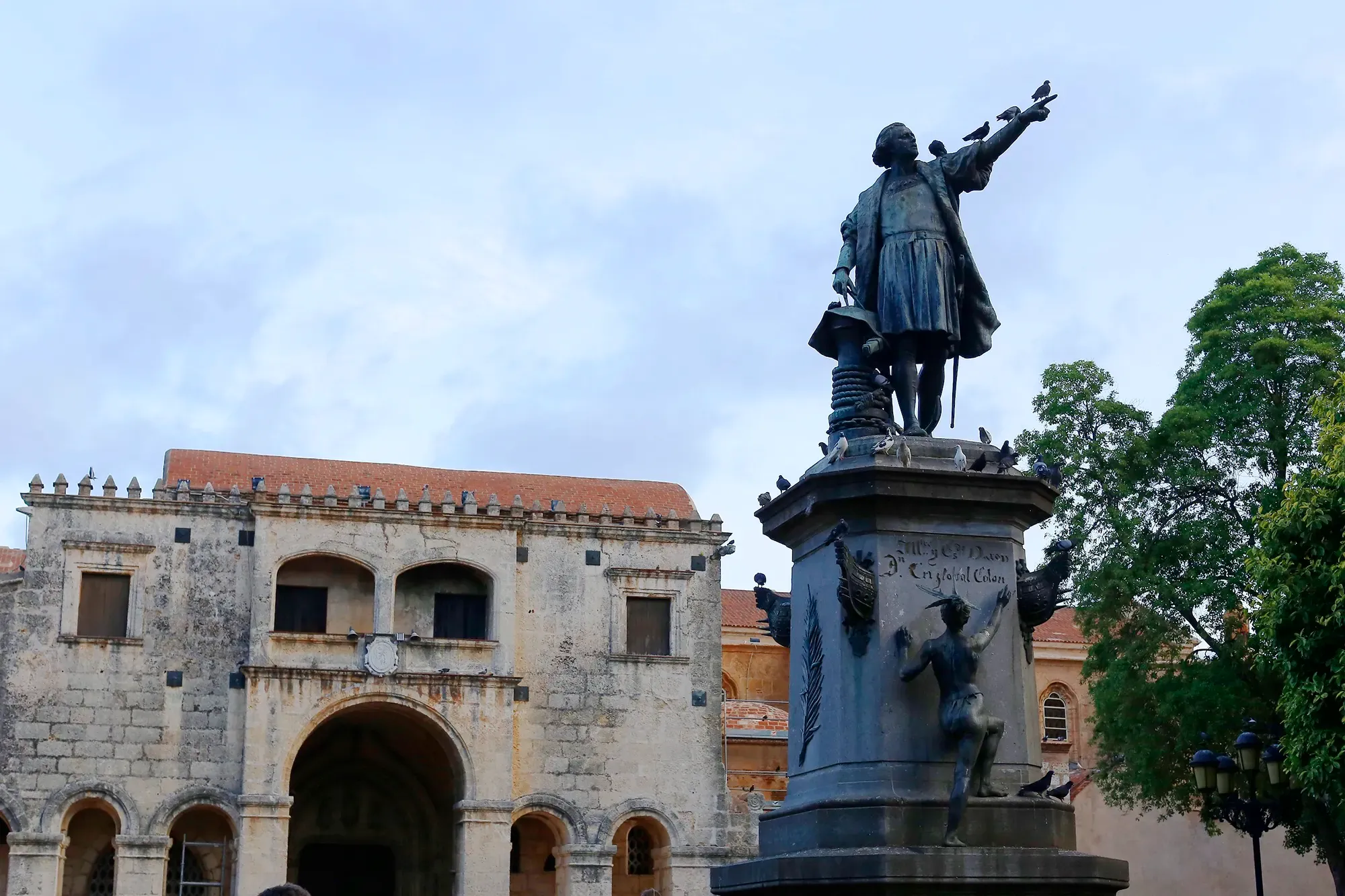 A weathered colonial-era building and monument in Santo Domingo's Colonial Zone, Dominican Republic