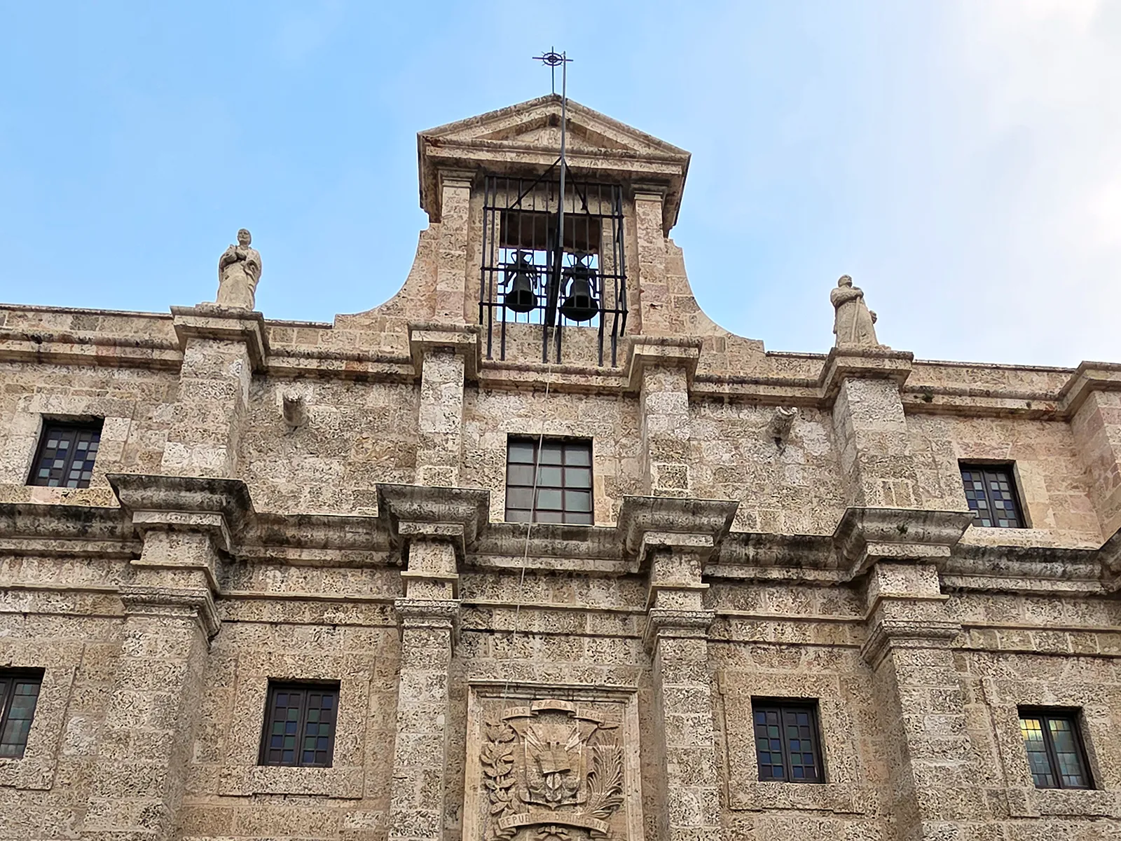 The stone facade of a historic colonial building in Santo Domingo, Dominican Republic
