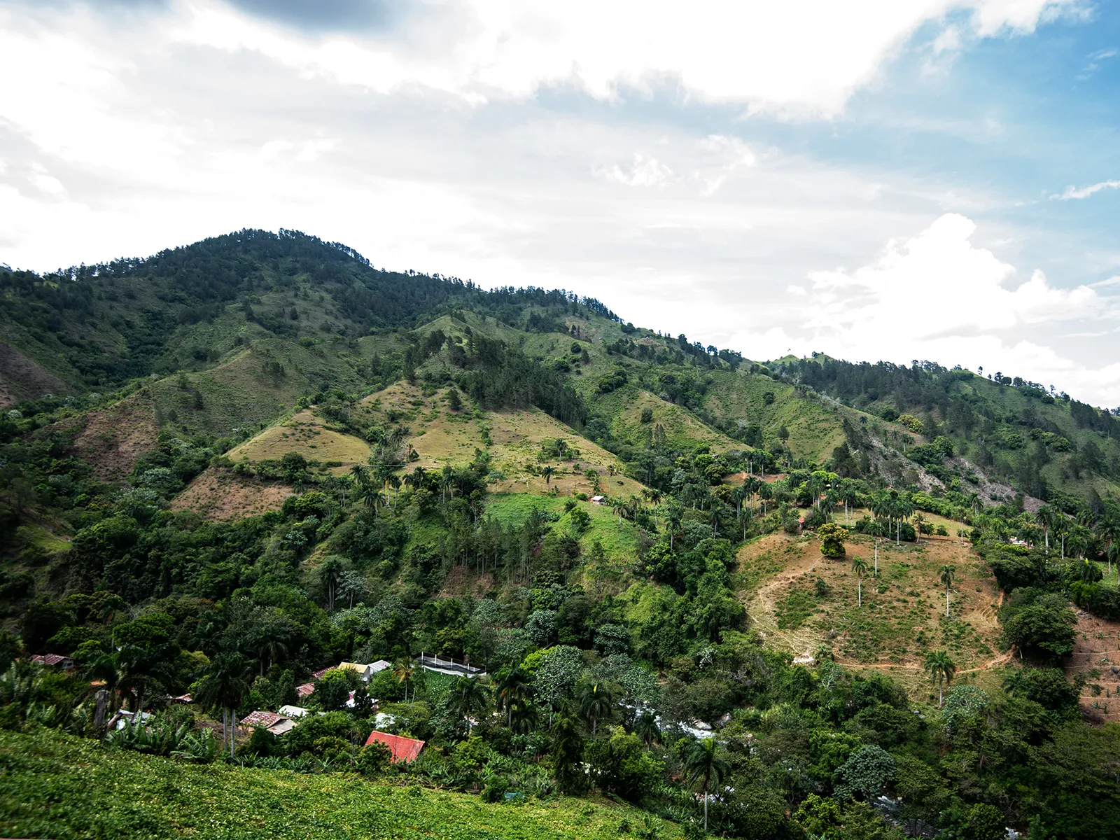 Green mountain hillsides forming a watershed in the Dominican Republic