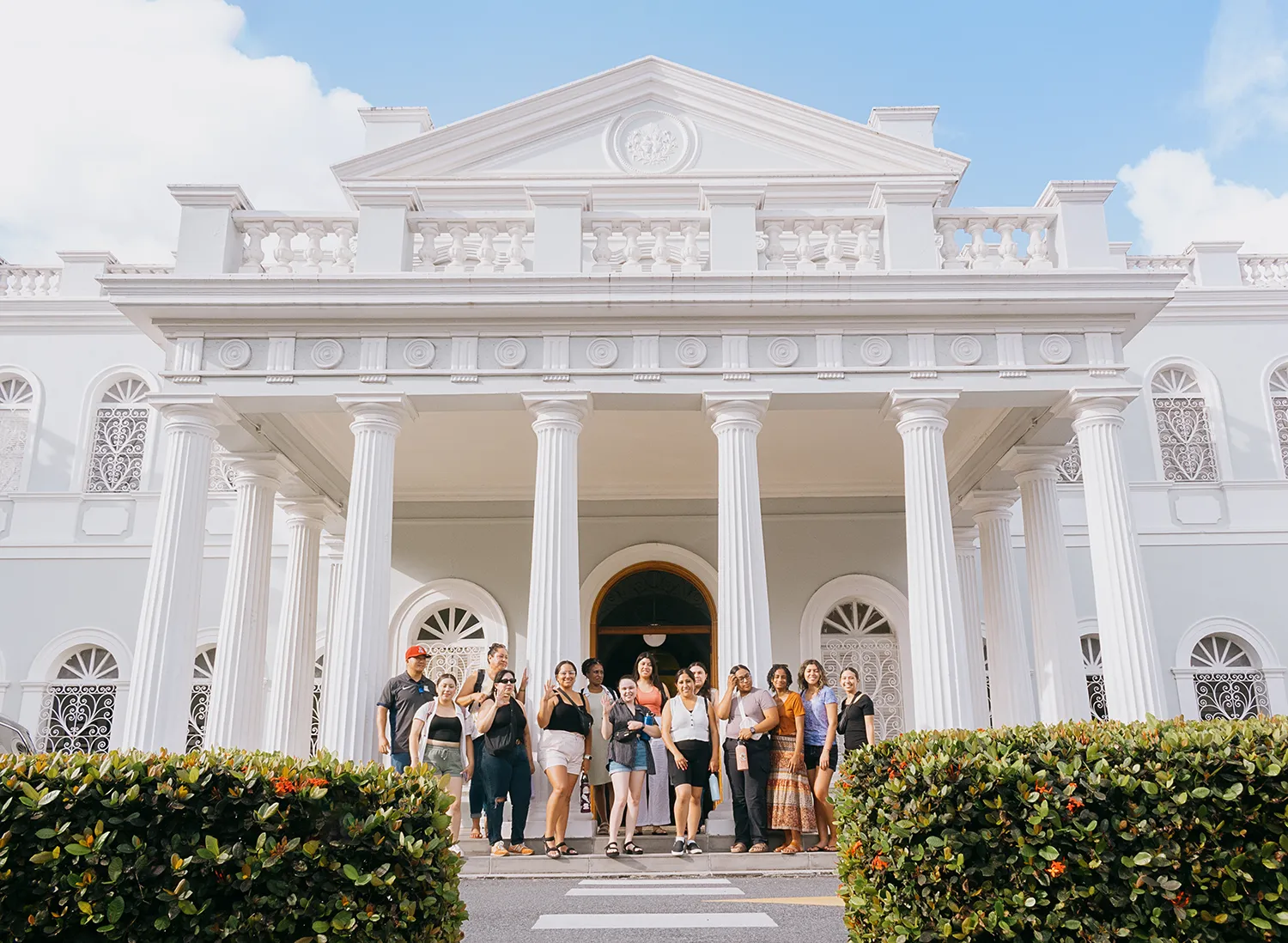A grand white neoclassical building with columns in San Juan, Puerto Rico