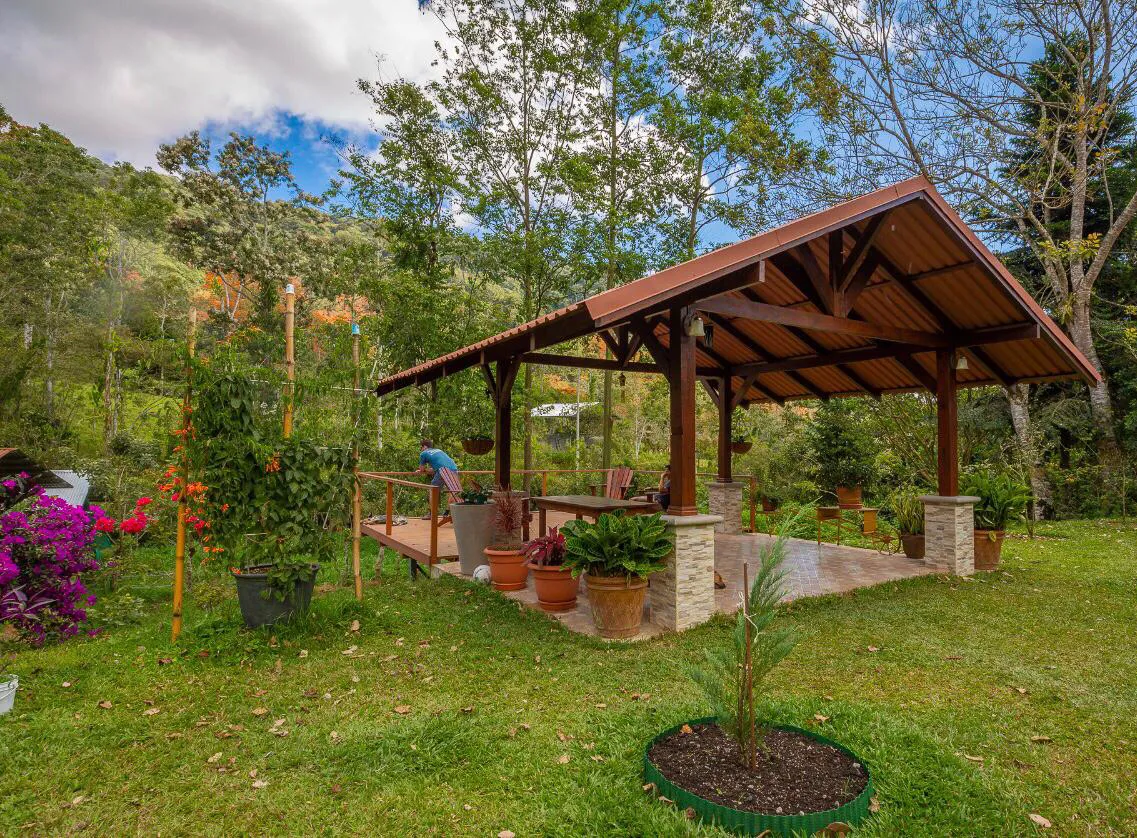 An open-air covered patio at a rainforest lodge in Turrialba, Costa Rica