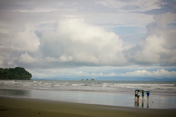 A moody, cloud-filled sky over the ocean along the coast in Costa Rica