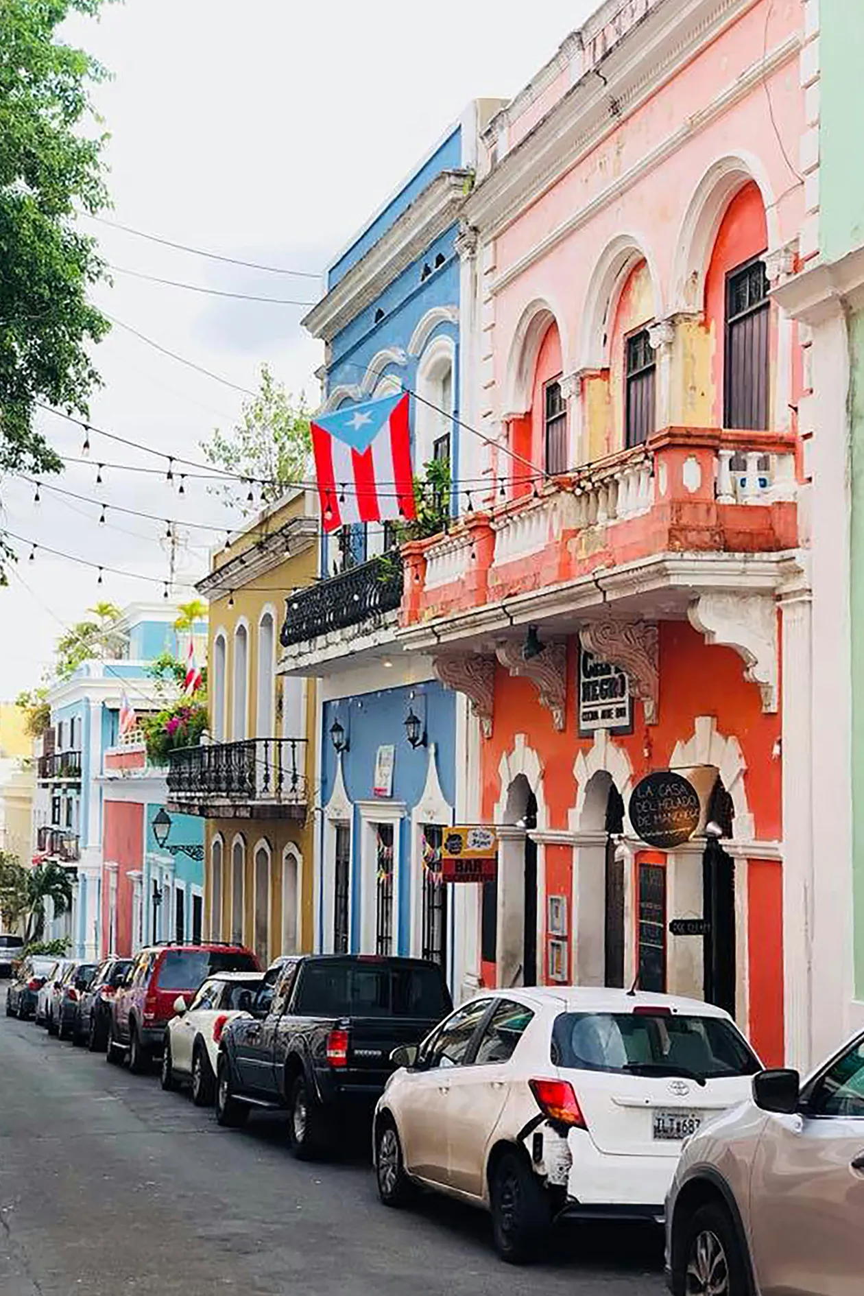 Colorful colonial buildings along a cobblestone street in Old San Juan, Puerto Rico