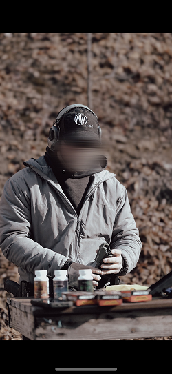 SOCOM II – shooter at the range with SOCOM II bottles