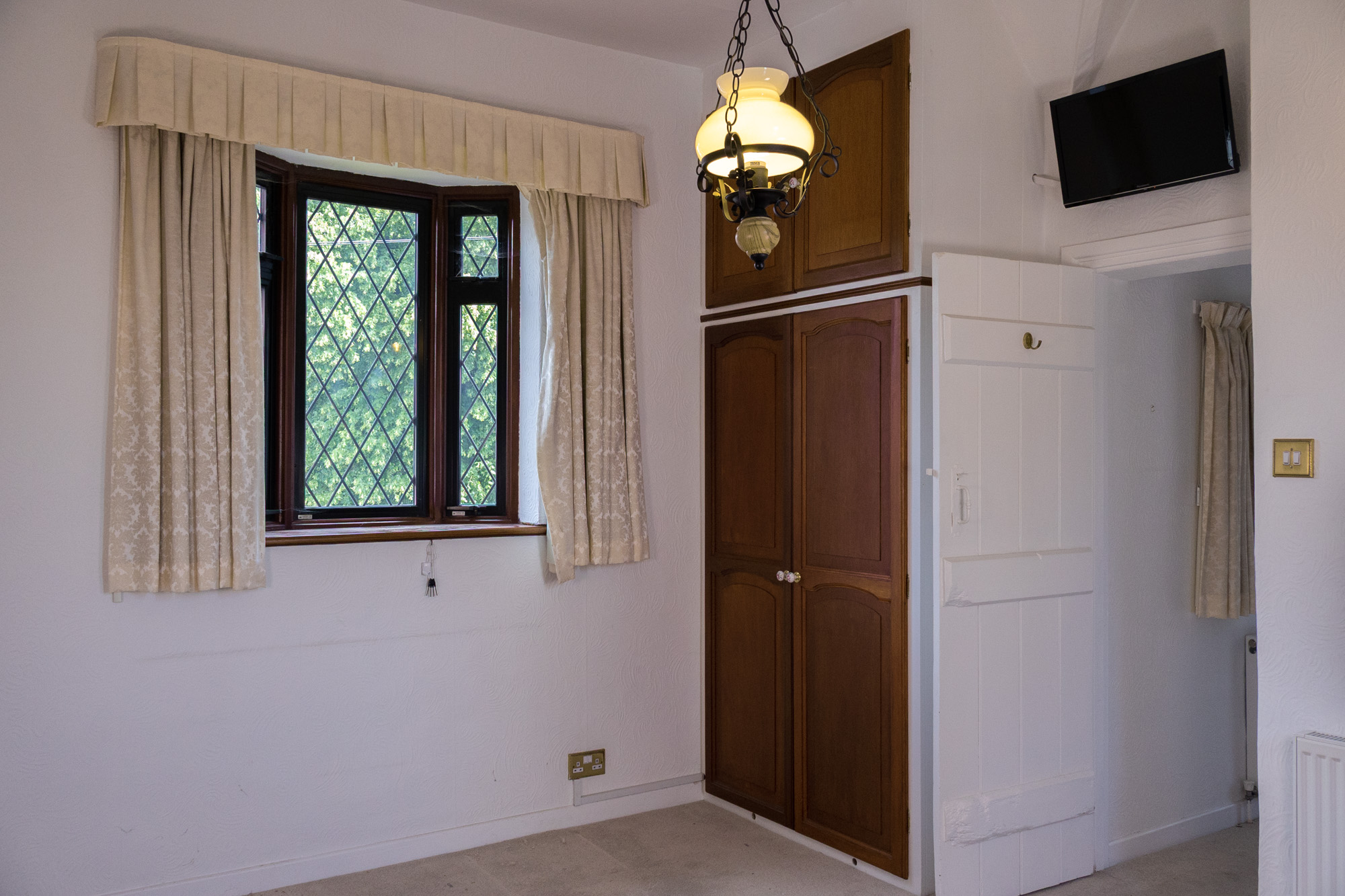 Bedroom in the property before renovation