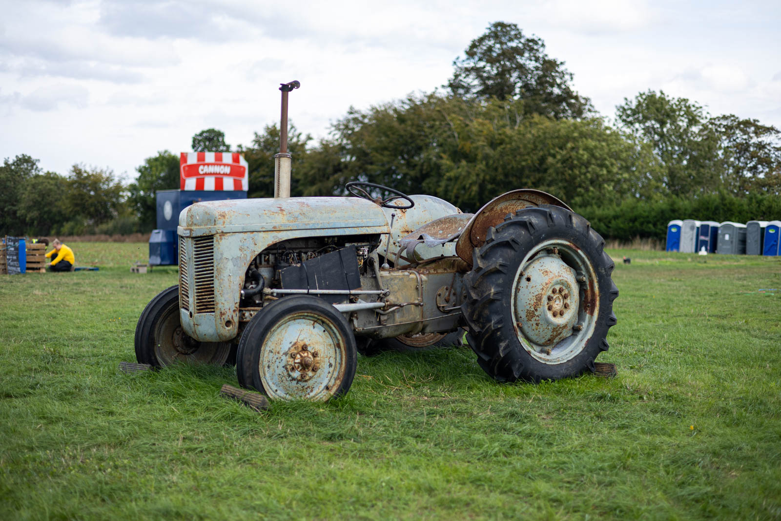 Vintage grey tractor parked on the field at Overstone Grange Farm