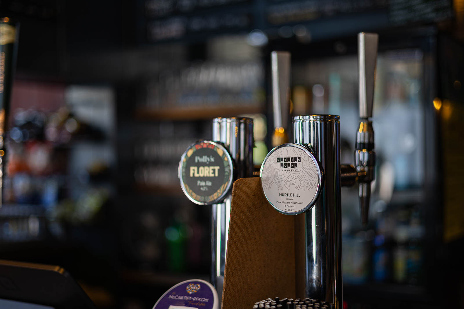 Craft beer taps on the bar at The Garibaldi Hotel