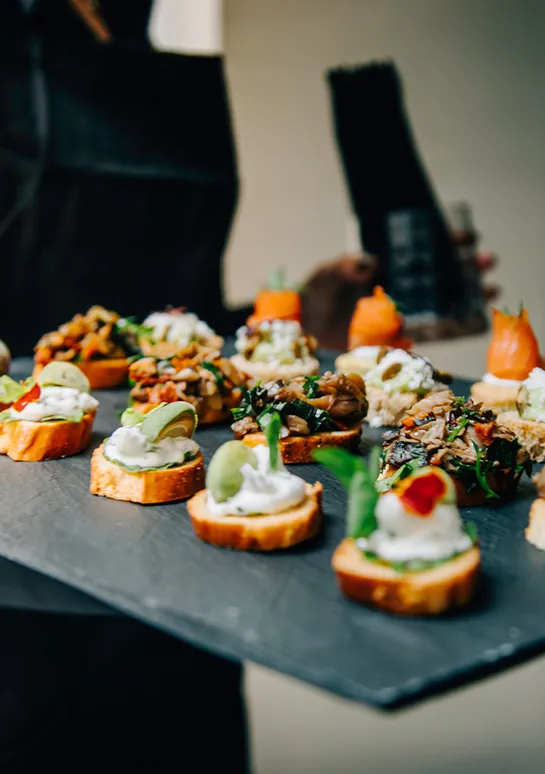 The Perfect Table staff serving at a catered NYC event