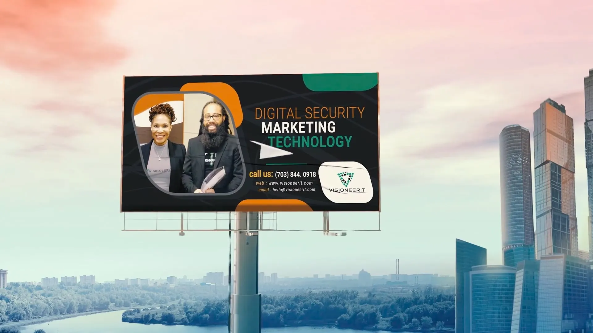 Billboard with two smiling professionals promoting digital security, marketing, and technology services along a river with city buildings in the background.