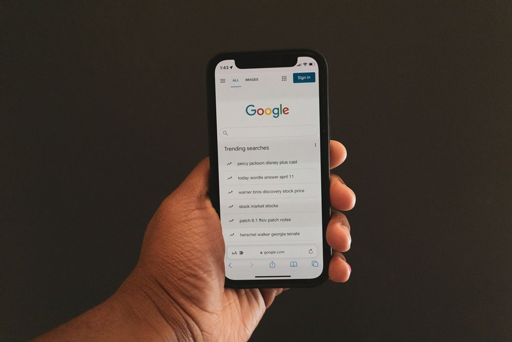 Searching for a local business on a phone.
