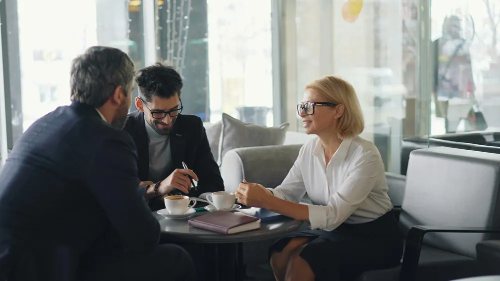 Law firm team planning its marketing budget