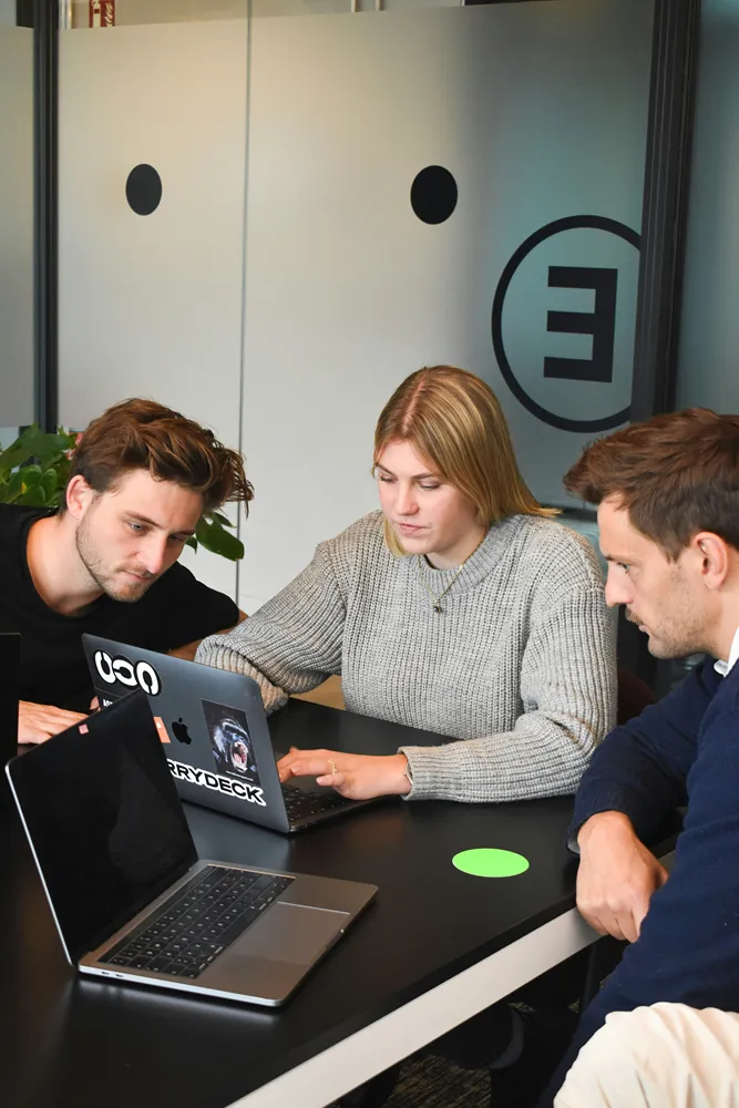 Web design team reviewing a website redesign plan together