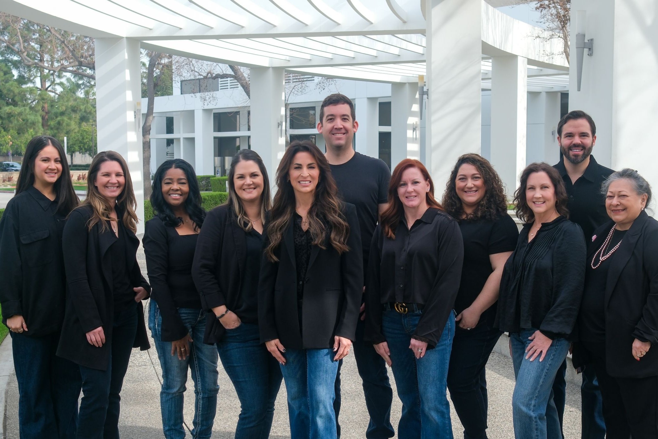ShowMax team photo under a decorative structure.