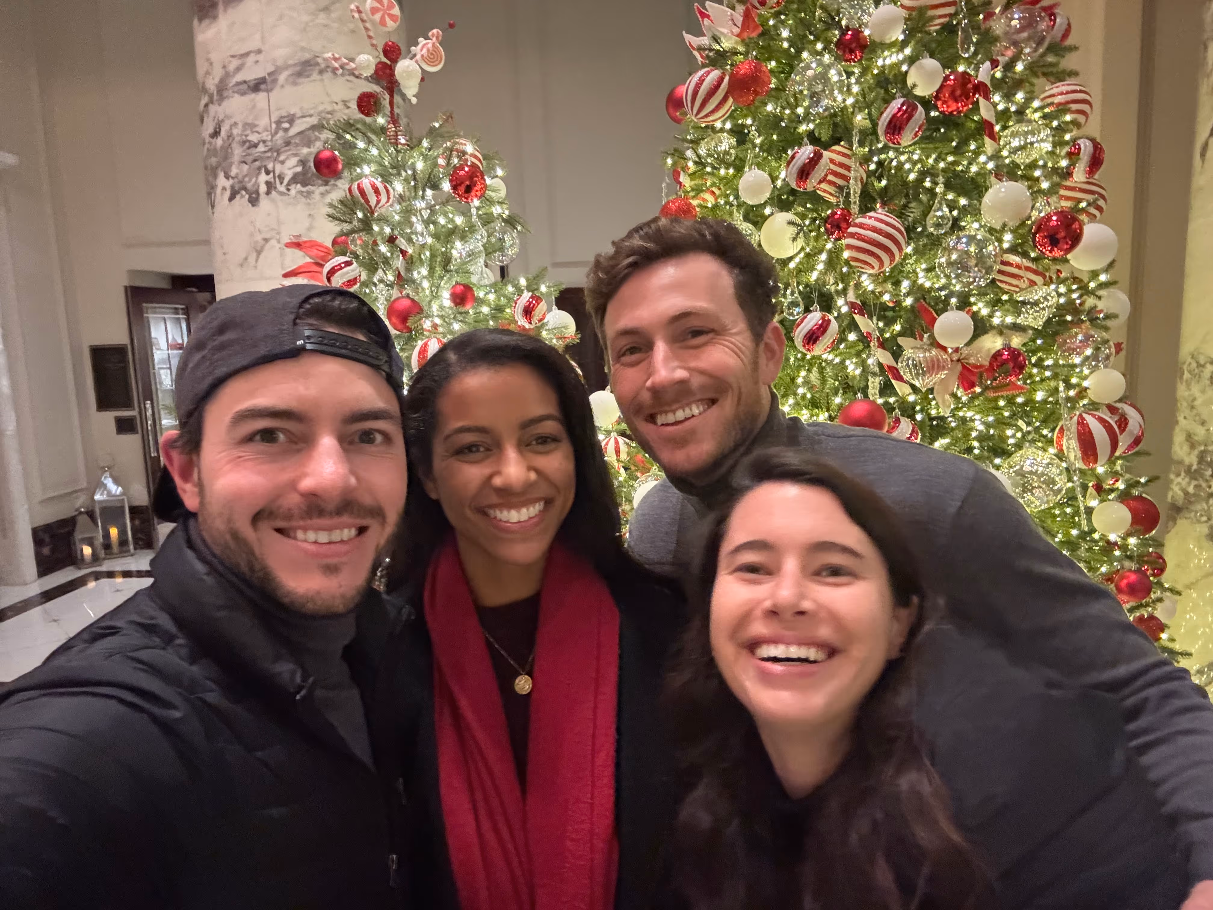 Mixing matcha with bamboo whisk, next to organic matcha package
