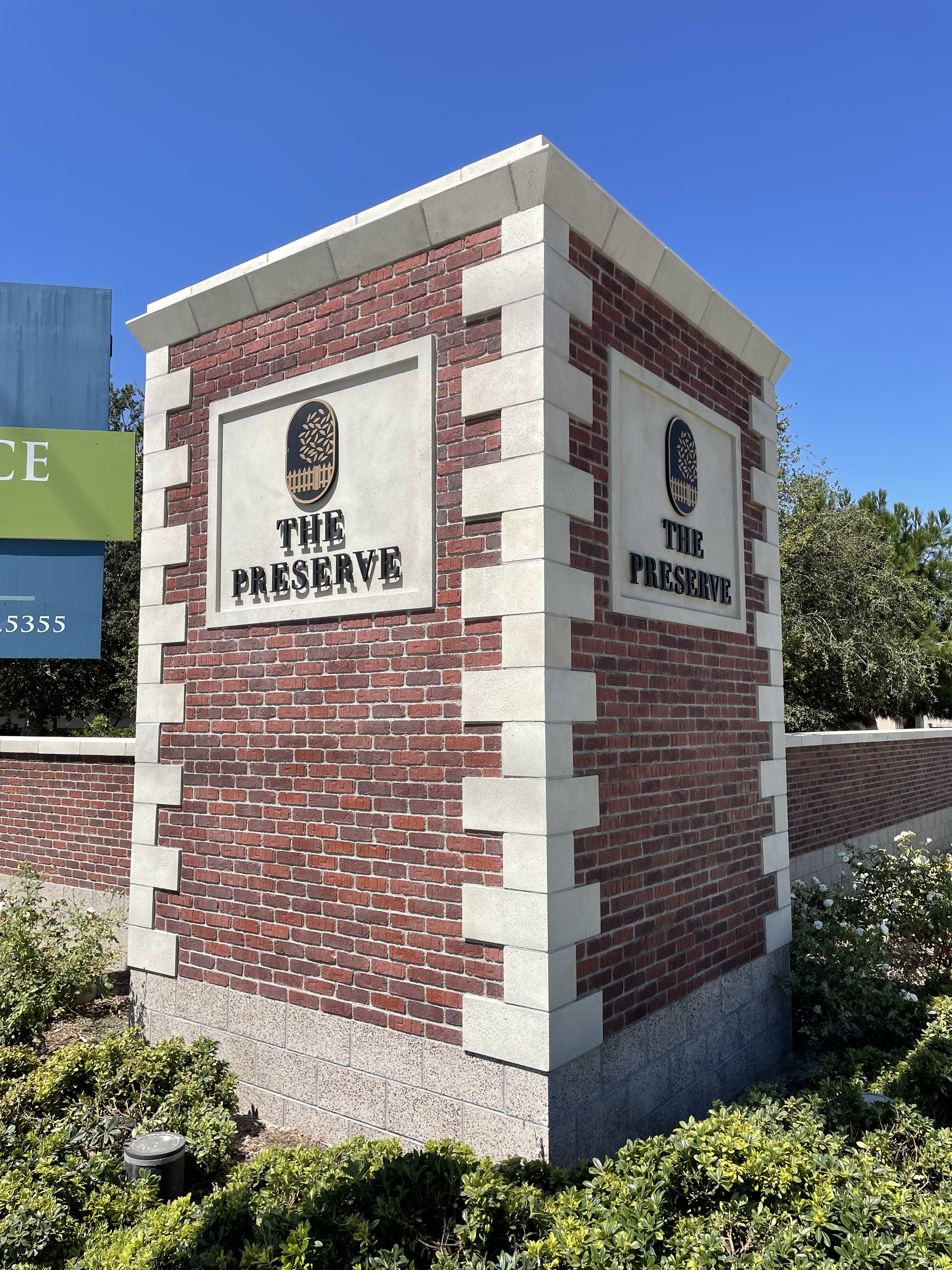Brick and stone entrance sign for The Preserve neighborhood