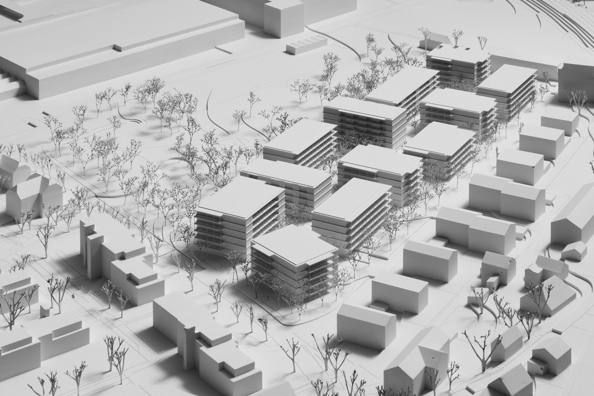 Weisses Architekturmodell einer Überbauung.