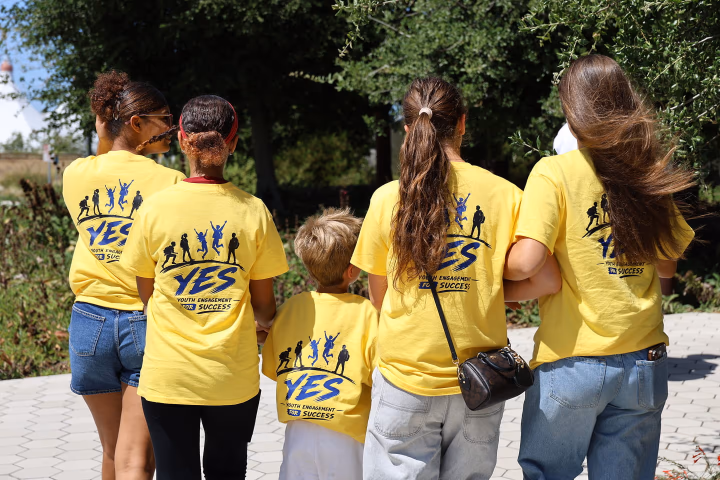 Members walk during the program