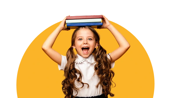 A happy young girl with books on her head