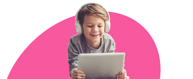 A young boy playing on this tablet