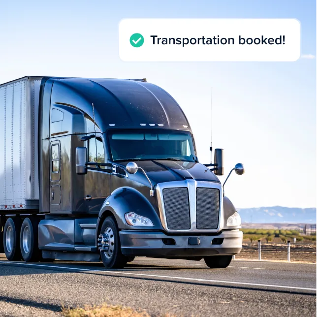 Black semi-truck driving on a highway with a background of clear sky and distant mountains, accompanied by a checkmark and the text 'Transportation booked!'