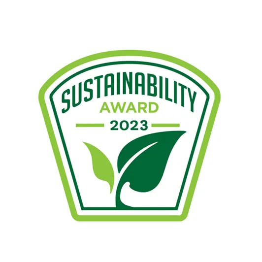 2023 Sustainability Award badge with two green leaves inside a pentagon-shaped border.