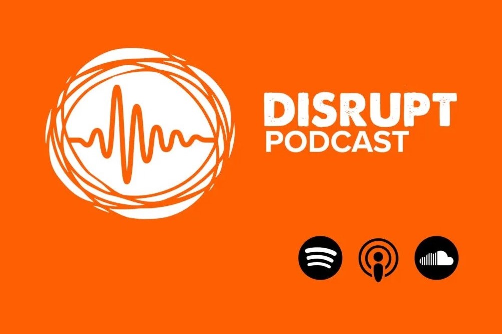 Orange background with a white circular soundwave logo and the text 'DISRUPT PODCAST' alongside Spotify, Apple Podcasts, and SoundCloud icons.