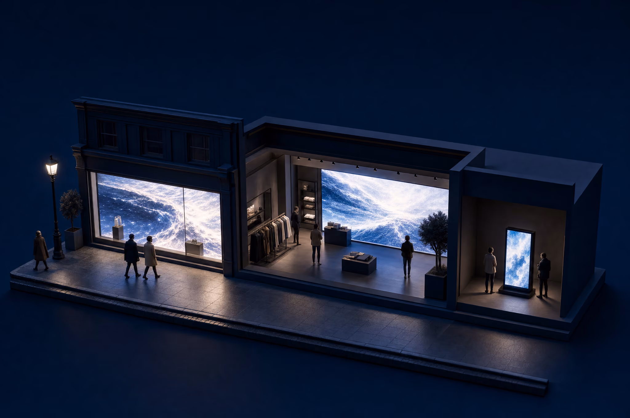 Miniature model of a high street at dusk showing the retail customer journey: a glowing LED shopfront window, an in-store LED feature wall, and a freestanding LED poster display