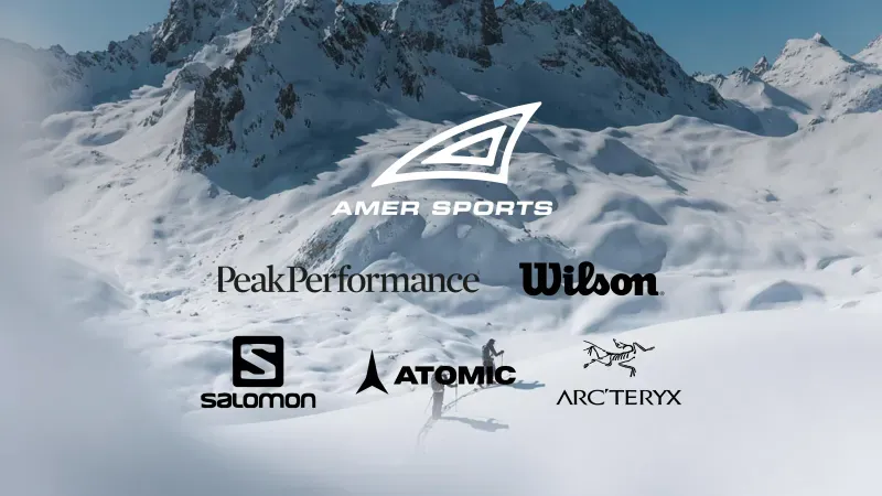 Amer Sports brands including Salomon, Atomic, Wilson, and Arc'teryx showcased in a winter landscape.