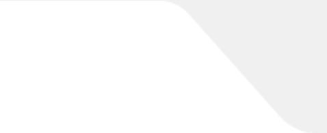 Abstract white and light gray angled geometric shapes on a rounded background.