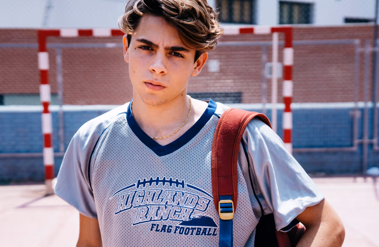 Student wearing custom printed school spirit t-shirt showcasing personalized apparel.