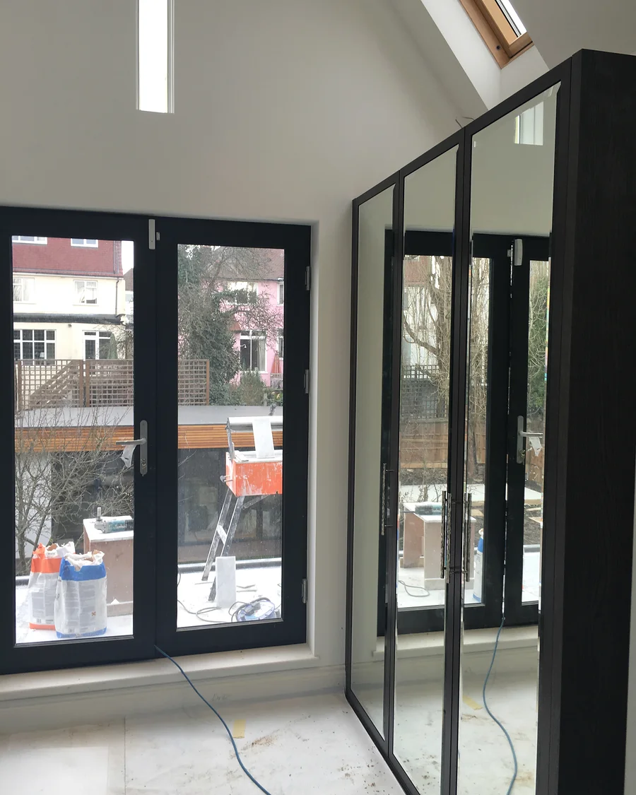 Regent’s Park Residence · Framed mirrored doors and rooflight — installation photographs