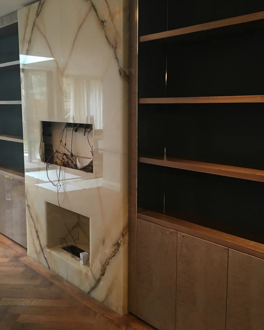Regent’s Park Residence · Fitted shelving and unfinished fireplace surround — installation photographs