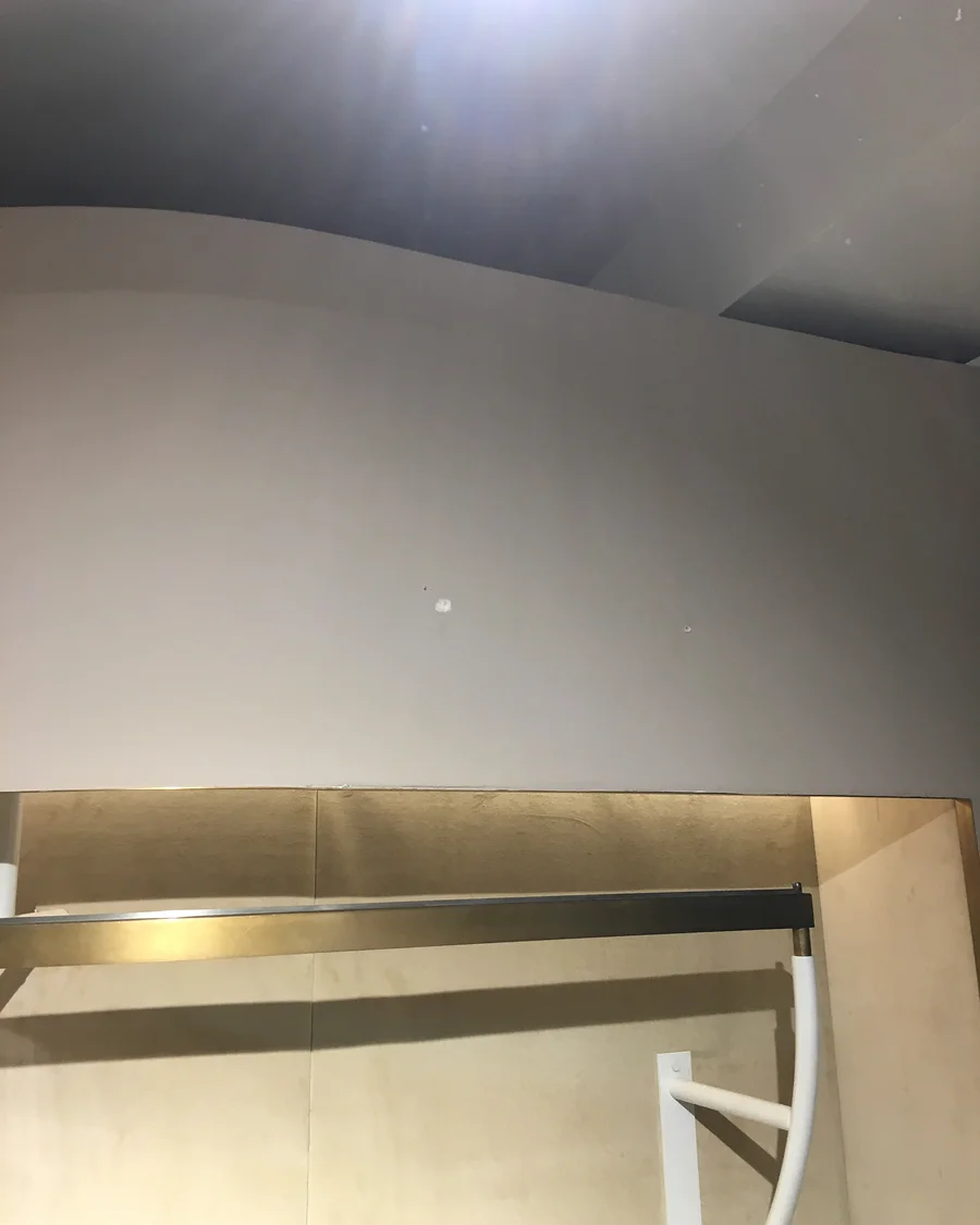 NU at Liberty · Fitted rail and curved display detail — installation photographs