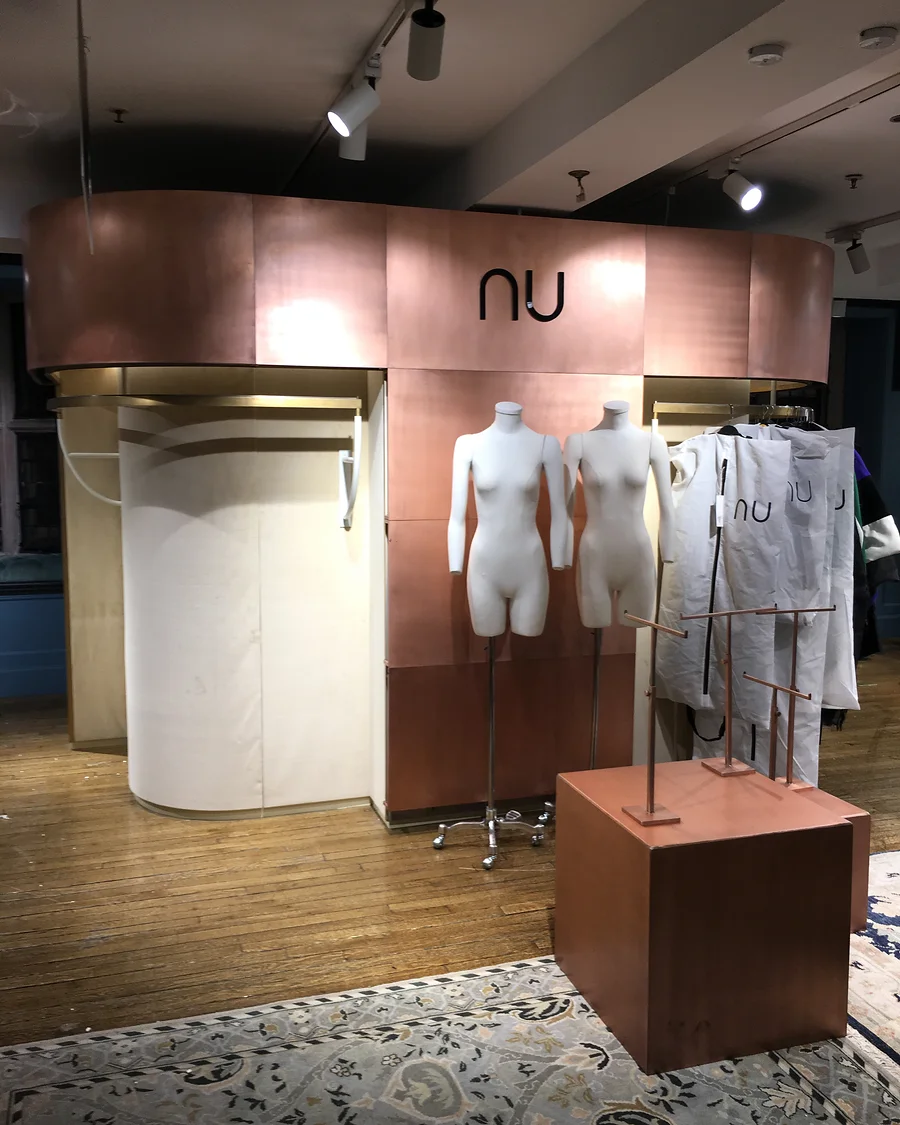 NU at Liberty · Display with clothing rails in place — installation photographs