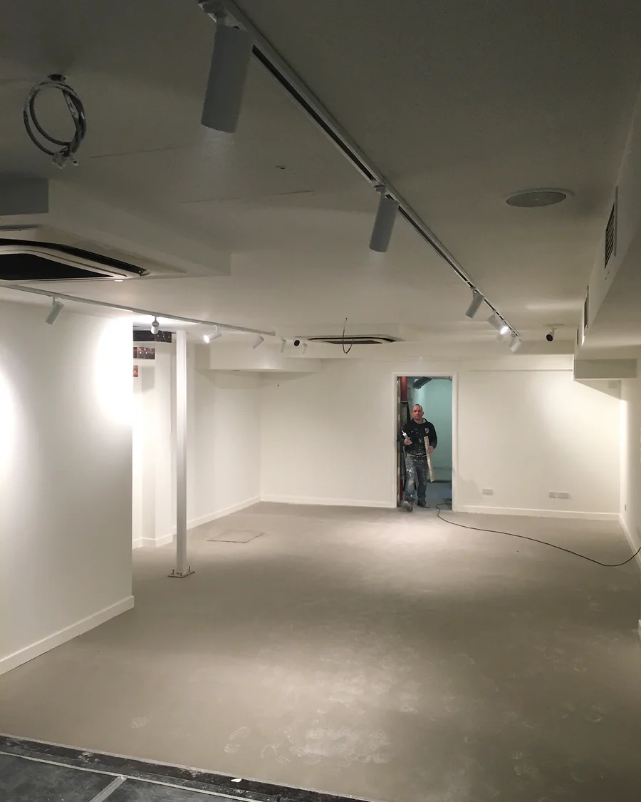 NU · King’s Road · Floor and lighting before furnishing — installation photographs