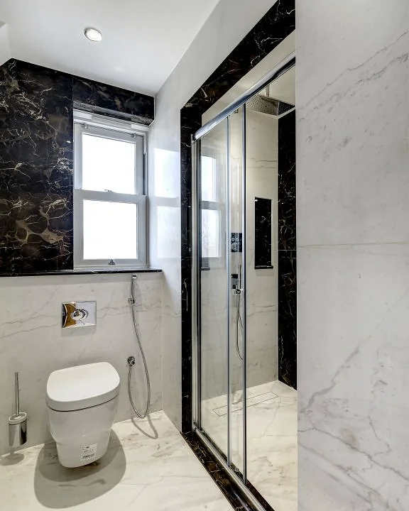 Marble & stone · Bathroom with contrasting wall panels