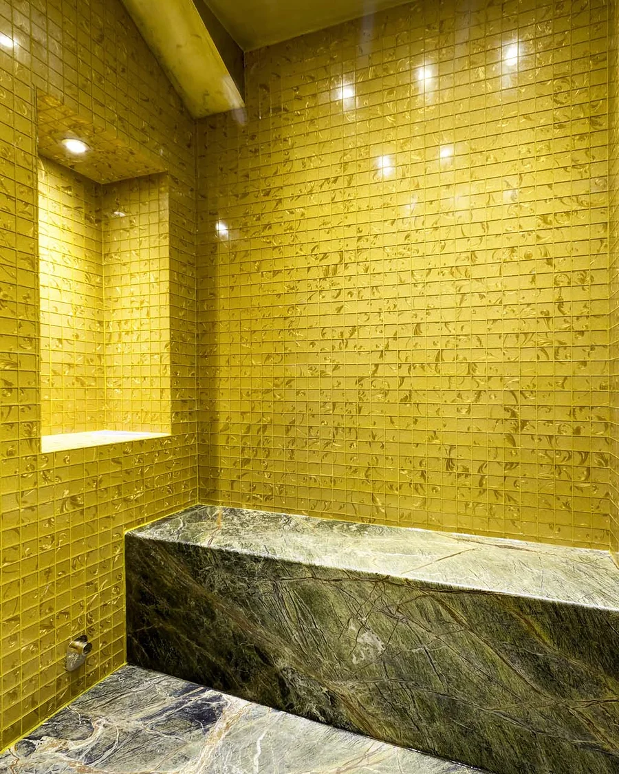 Marble & stone · Stone bench and recessed mosaic shelf